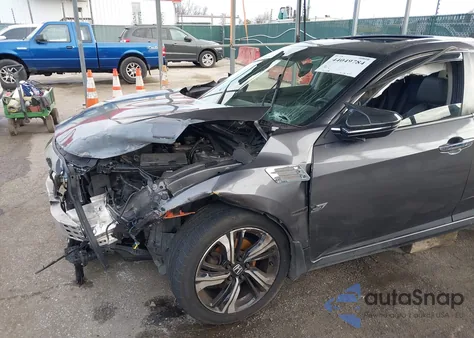 2017 Honda Civic Touring z USA, uszkodzony, nr VIN 19XFC1F94HE012412